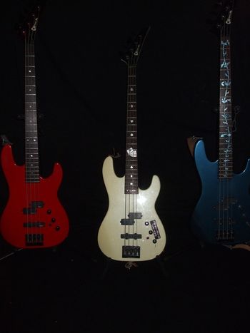 The Patriotic Triplettes. L-R: Red, White & Blue Charvel Basses. All Mid 80's.
