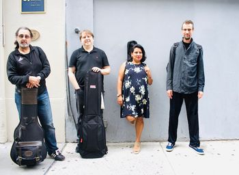 Isabel and The Whispers  (From left to right:  Octavio Padron - guitar; Scott Gleason - bass; Isabel - piano/vox/guitar; Alec Menge - drums)
