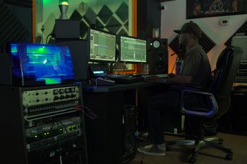 RJ Full Range in the studio creating a pop beat
