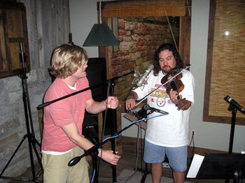 2006 - Recording in Nashville - Colin miking Keith up to do some great fiddling..
