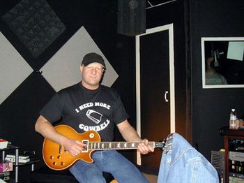 2006-We finished working on the new CD. Gary Morse, our fine
producer and good friend, flew out west for the rest of the
overdubs. We worked at the Steak House in North Hollywood.
Thanks to Brent Wood for being so accommodating to us.
Here's a shot of Gary in his producers shirt!
