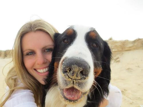 Co-owner Zoie and one of her Bernese Mountain Dogs, Kaiser