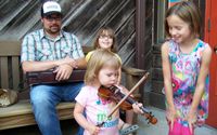 Karly Dawn teaching Old TIme String Band at Cowan Creek Mountain Music School 2022