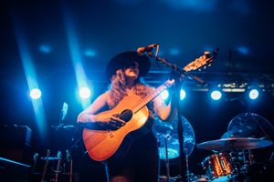 Americana singer/songwriter Sarah King playing acoustic guitar with K&K pickups installed