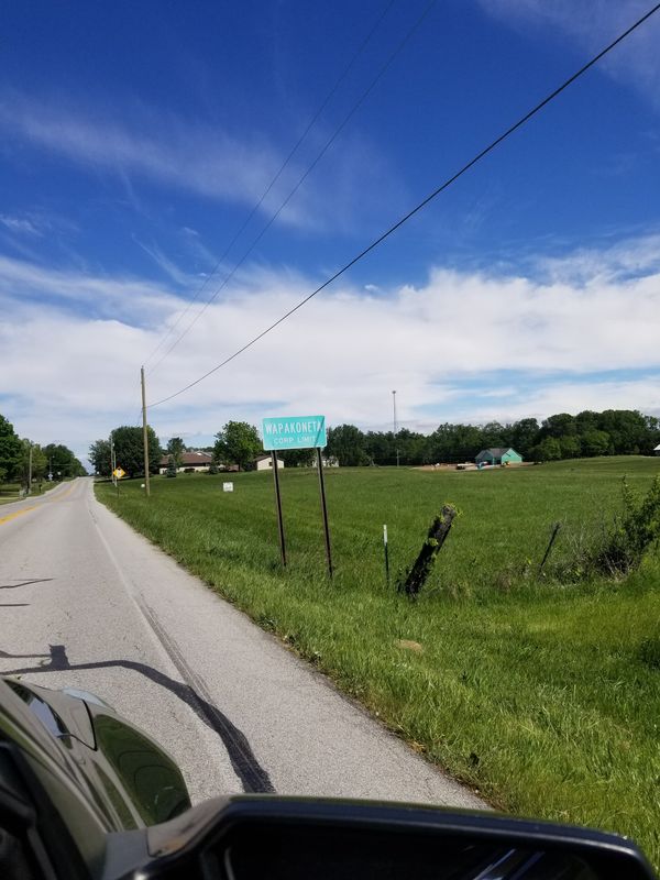 Rural scenery with Wapakoneta city sign