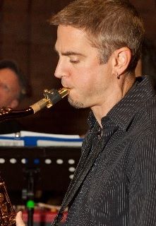 Rich Williams plays alto and tenor sax.  He is a talented music teacher and an outstanding performer whose soaring, heartfelt solos drive the band to strive for new musical heights.
