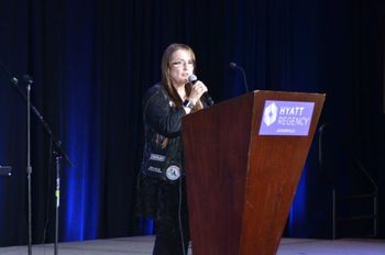 Ann presenting KIA Ceremony for Benghazi Commemoration, 2018, Fla
