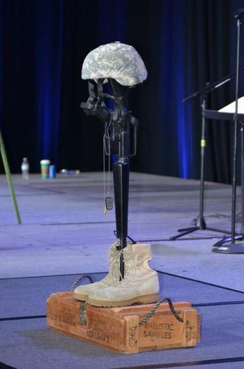 Benghazi Memorial 2018, Fla., Ann's Battlefield Cross on Stage for her KIA presentation & song, "Who Will Take My Place?"
