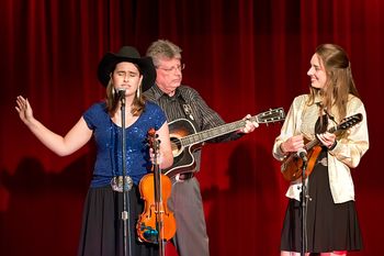 Marina, sister Emma Jane, and dad Scott perform at the Spotlight Theatre in Tulsa, Oklahoma.
