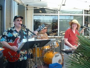 Bruce Truitt, Jimmy Fenno and Marilyn Rucker at a beach party gig at the lake.
