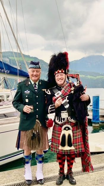 Col in Chief Justin R. Fogarty with Piper Chef at his new boat's christening at Sisikon Boat Club
