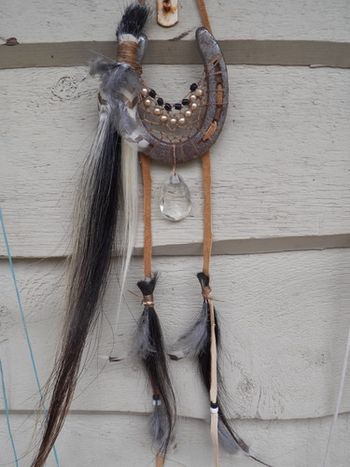 I made this in May 2012 for Ceci and her horse Missy. Missy lived a long time, she was a black and white paint. I put feathers on the dreamcatcher
