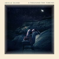 A Thousand Tiny Torches by Arielle Silver