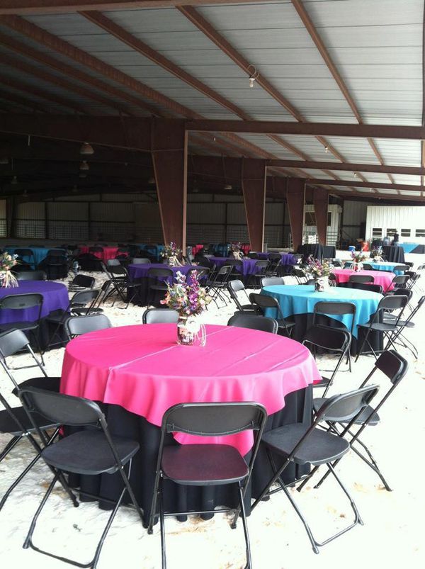 The arena set up for a beautiful outdoor wedding under the covered arena with dance floor and DJ! 