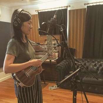 Kim recording vocals and ukulele

