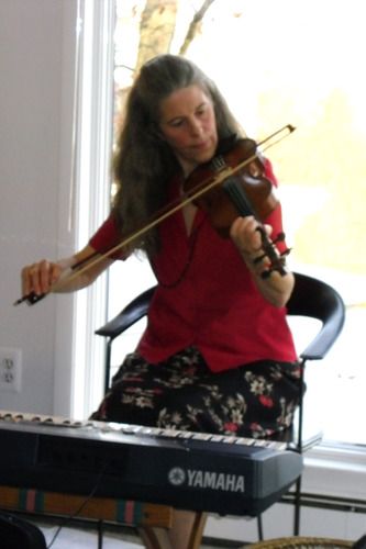 Gina Tlamsa plays fiddle on "Woody" and "Corporate News"; flute on "Wonder" and "The Way"; and keyboards on "Direction" and "The Way".
