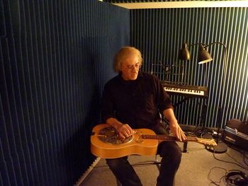 Tom DiPaolo plays dobro on "Direction" and "What Would Woody Write?"
