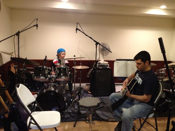 Chris jams with Shane A. during a recent lesson.