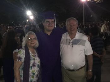 The graduate with his dad's parents!
