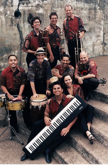 From the CD "Madre Rumba, Padre Son," photo by Irene Young (Shot Dec-1999, at Marin Headlands, Ca). From L to R and Top to Bottom, Jeff Cressman, Marty Wehner, John Gove, Julio Areas, Edgardo Cambón, Eric Rangel, David Belove, Ben Heveroh and Sandy Cressman.
