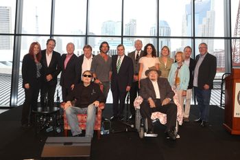 Newly announced Country Music Hall of Fame inductees Ronnie Milsap (front l) and Mac Wiseman gather with CMA Board members during the 11th Annual CMA Artist Luncheon at the Country Music Hall of Fame and Museum. (back l-r) Victoria Shaw, Owner of Victoria Shaw Songs; Kix Brooks; Troy Tomlinson, President and CEO of Sony/ATV Music Publishing; Jeff Walker, President of AristoMedia Group; Brett James, Owner/CEO of Cornman Music; Ed Hardy, CMA Board Chairman; John Esposito, President and CEO of Warner Music Nashville and CMA Board President Elect; Kerri Edwards, President of KP Entertainment; Sarah Trahern, CMA CEO; Jo Walker-Meador, former CMA Executive Director and Country Music Hall of Fame member; Jody Williams, Vice President Writer/Publisher Relations at BMI; and Ed Benson, former CMA Executive Director. Photo Credit: Alan Poizner (CMA)
