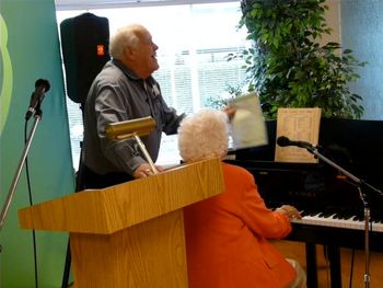 Jean playing stride piano and sings a song often sung by the women to encourage each other.
