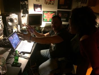 John Campos and Eve Soto watching an early edit of the "Fear of Landing" video.
