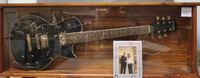 GUITAR IN DISPLAY CASE (Autographed)
