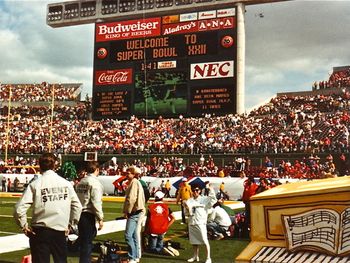 Shooting on the sidelines for ABC Sports' coverage of SUPER BOWL XXII (wearing white)
