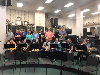 Band members Kevin Gianino, Ben Reece, Andy Tichenor, and Dave Dickey working with students.
