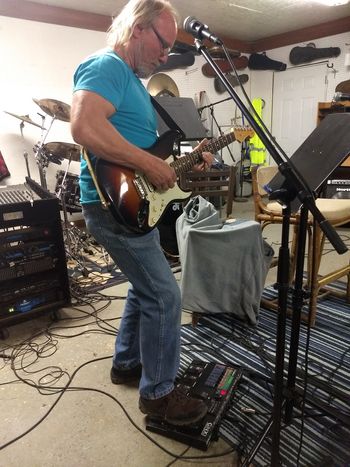 Dewayne creating a lead guitar lick for a new ORB song being recorded
