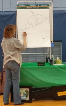 Kim drawing at school appearance