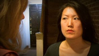 Betty (Weisi Li) asks Ellie (Jane Blass) for help  — from the 48 Hour Film Project HER TUN OF TREA Written and co-directed by Christopher Cartmill
