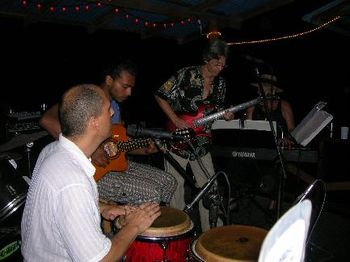 Carter on congas, Luciano Gomez on acoustic
