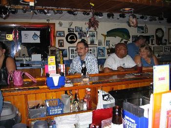 A nice shot of the bar, and some drinkers.
