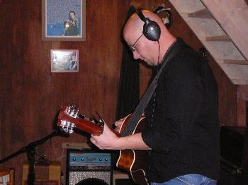 Bryan Gordon records guitar on Belgian Countryside.
