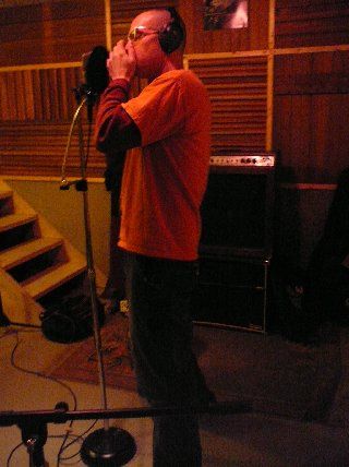 Fred laying down the one-take harp track for Jersey City.
