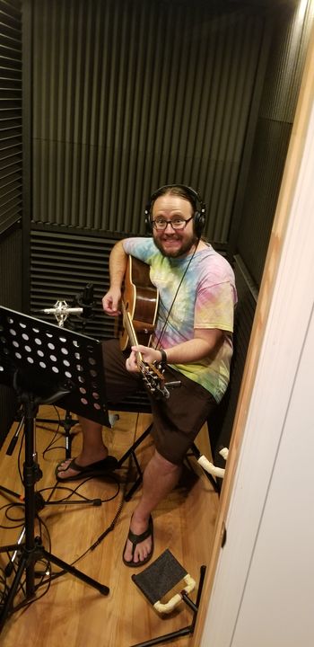 Matt Griffith tracking acoustic in the guitar booth
