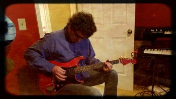 Andrew Henderson tracking guitar on Garrett Baker's new album.
