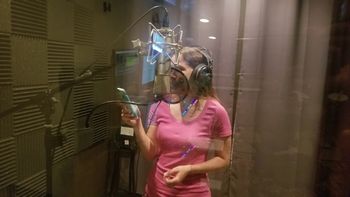 Lesli Hall tracking vocals in the booth.
