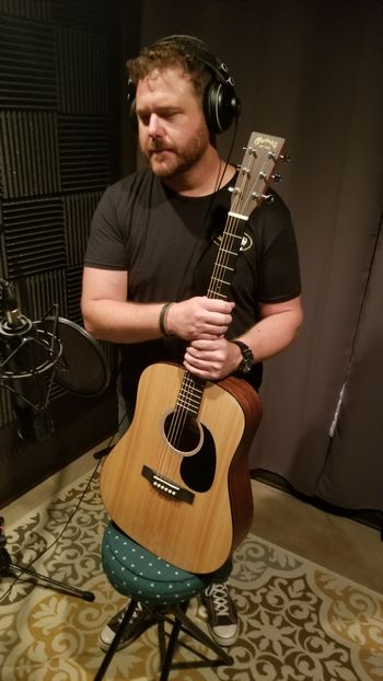 Garrett Baker about to record some guitar.
