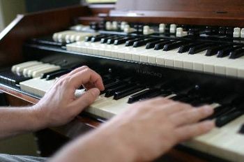 Ken's Hands on Organ (Photo by John McNally)
