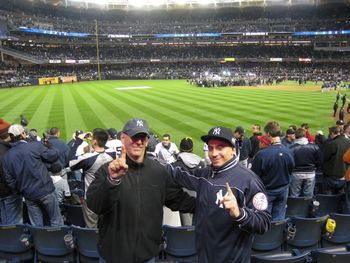 At Yankee Stadium on 11/4/09 with my son, Sean, after Game 6 of the World Series where the Yankees won their 27th World Championship. You can see the celebration in the background.
