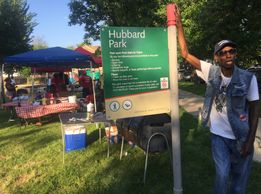 Larry Taylor and Hubbard park sign