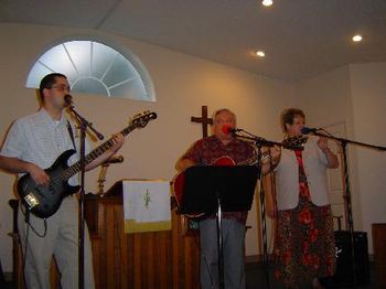 Tim, Lynn and Mary Doing a Trio Rendition in Gospel Concert in a Church Appearance.
