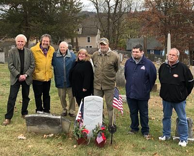 Aretas Culver descendants and speakers from the Bristol Historical Society flank Veterans Strong Director Donna Dognin behind the new Culver headstone.