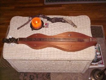 My new redwood dulcimer my family and a few close friends pitched in for to help me celebrate my bir
