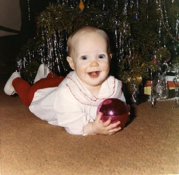 My First Christmas...my head looks just as round as that bulb (1969)!

