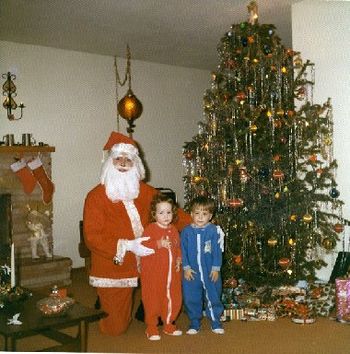 Me and my twin brother, Chris, feeling unsure about Santa (1971).
