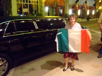 Mom beside Connie's limo and the Italian Flag she signed!
